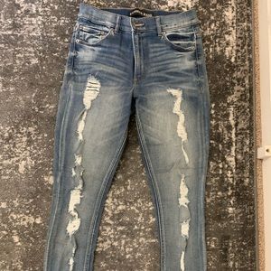 Distressed stretch skinny light wash jean